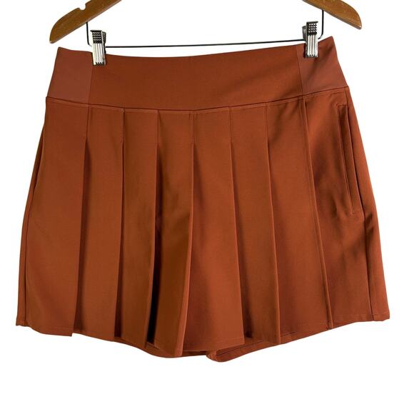 ATHLETA Endless Pleated Skort In Rust Orange Womens Size 12 - Picture 1 of 7